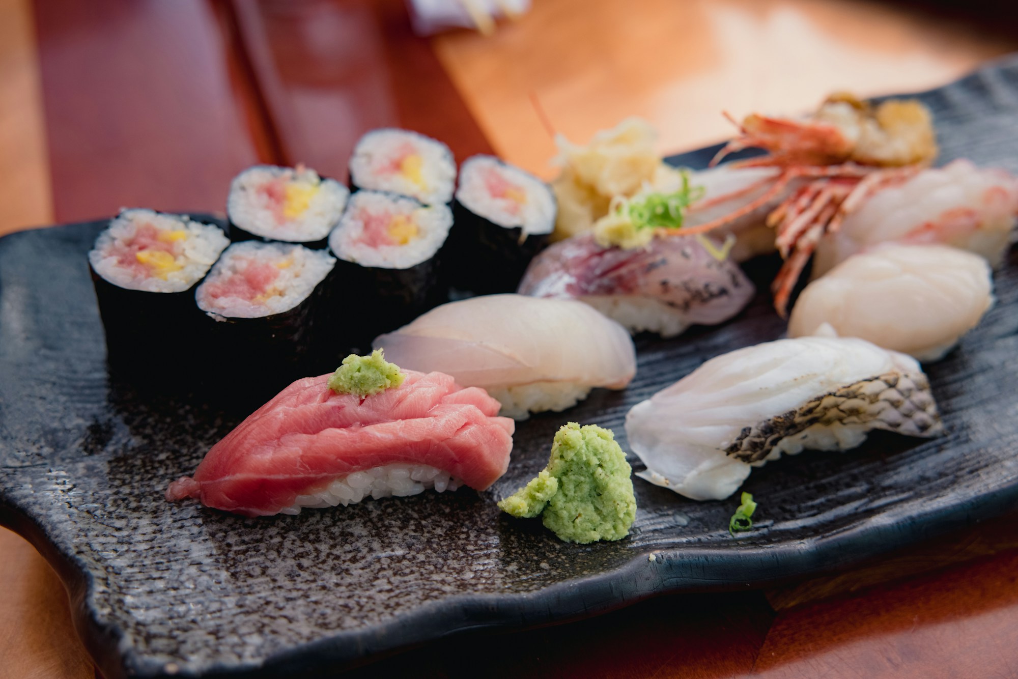 An assortment of sushi rolls and nigiri